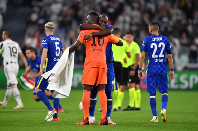 Romelu Lukaku and Edouard Mendy of Chelsea embrace prior to the UEFA Champions League (Photo by Valerio Pennicino/Getty Images)