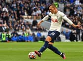 Argentinian midfielder Giovani Lo Celso passes the ball during the English Premier League football match (Photo by JUSTIN TALLIS/AFP via Getty Images)