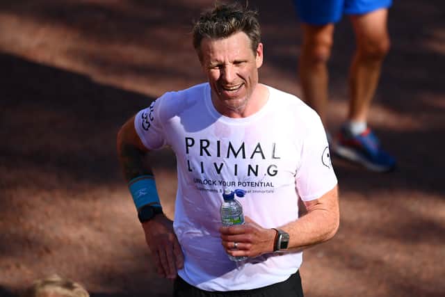 James Cracknell OBE reacts after finishing the 2021 Virgin Money London Marathon at Tower Bridge on October 03, 2021 in London, England. (Photo by Alex Davidson/Getty Images)