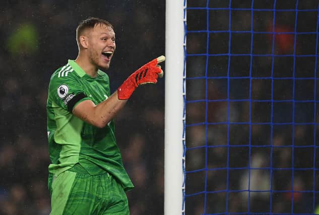 Arsenal’s English goalkeeper Aaron Ramsdale reacts after the English Premier League football match between Brighton and Hove Albion  (Photo by GLYN KIRK/AFP via Getty Images)