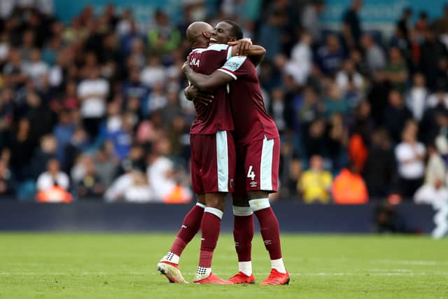 Angelo Ogbonna and Kurt Zouma of West Ham United celebrate victory following the Premier League (Photo by George Wood/Getty Images)