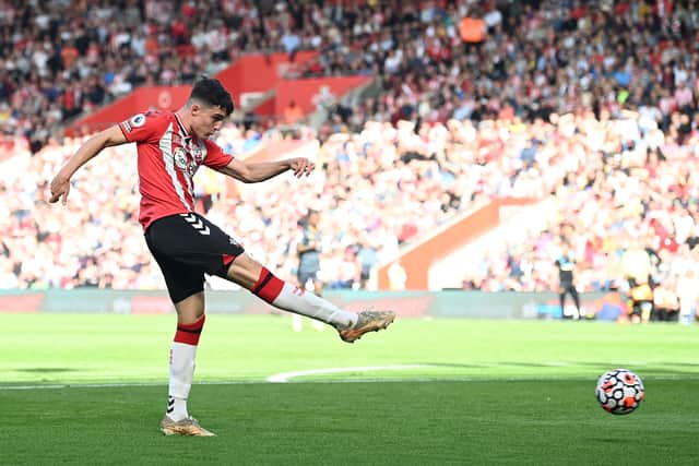 Southampton's English defender Tino Livramento shoots but fails to score during the English Premier League football (Photo by GLYN KIRK/AFP via Getty Images)