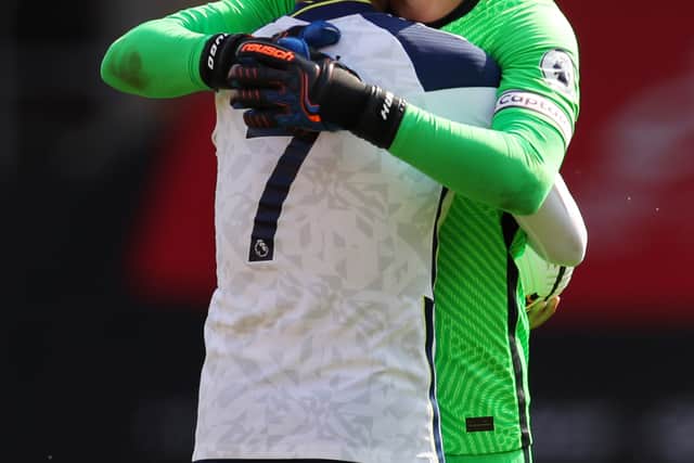 Heung-Min Son and Hugo Lloris of Tottenham Hotspur celebrate (Photo by Catherine Ivill/Getty Images)