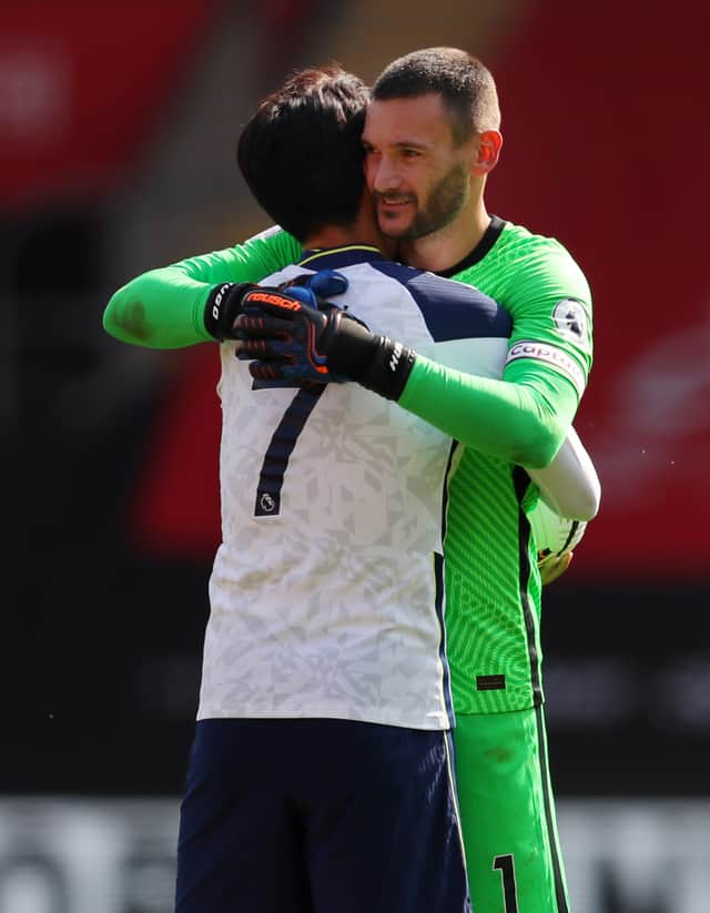 Heung-Min Son and Hugo Lloris of Tottenham Hotspur celebrate (Photo by Catherine Ivill/Getty Images)