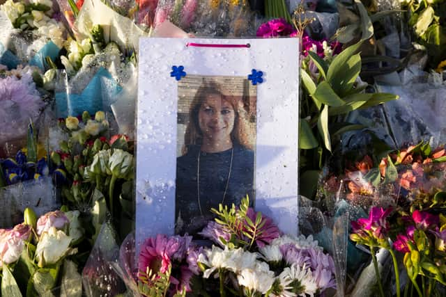 Flowers surround the Clapham Common bandstand memorial to murdered Sarah Everard (Photo by Dan Kitwood/Getty Images)