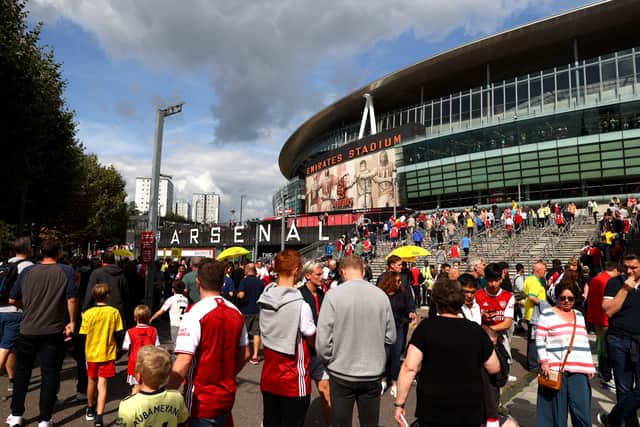 A general view outside the stadium as fans make their way towards the stadium prior to the Premier League match between Arsenal and Norwich City at Emirates Stadium on September 11, 2021 in London, England. (Photo by Julian Finney/Getty Images)