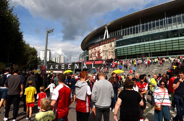 A general view outside the stadium as fans make their way towards the stadium prior to the Premier League match between Arsenal and Norwich City at Emirates Stadium on September 11, 2021 in London, England. (Photo by Julian Finney/Getty Images)
