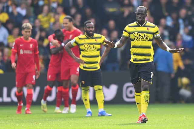 Moussa Sissoko of Watford FC shows his disappointment after the goal of Sadio Mane (Photo by Justin Setterfield/Getty Images)