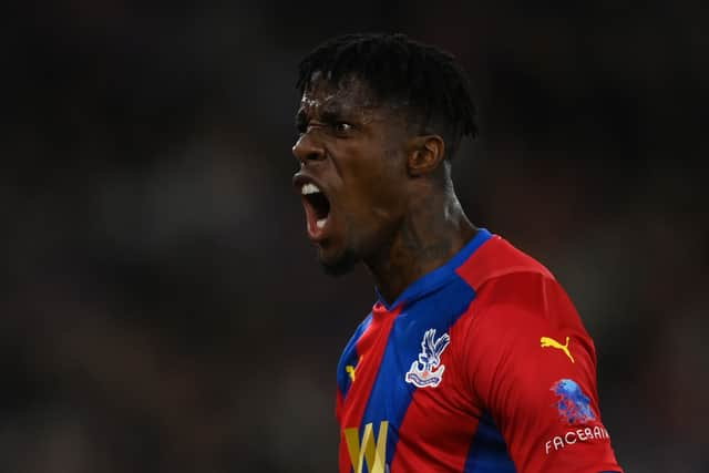 Wilfried Zaha of Crystal Palace celebrates in front of the Brighton fans (Photo by Mike Hewitt/Getty Images)