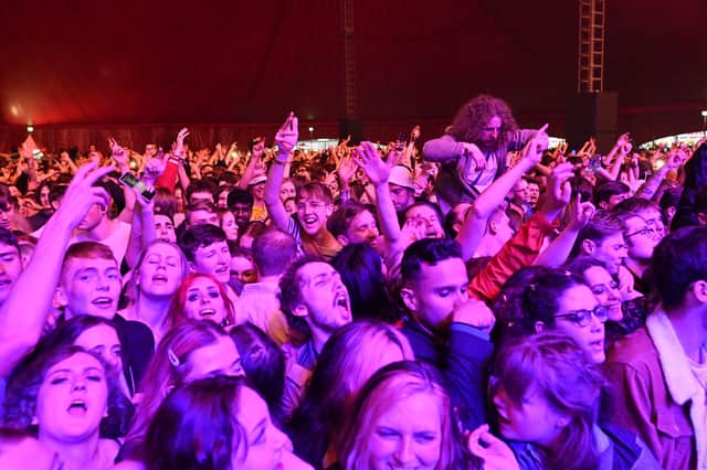Fans watch Blossom perform at a live music concert hosted by Festival Republic in Sefton Park in Liverpool, north-west England on May 2, 2021  (Photo by PAUL ELLIS/AFP via Getty Images)