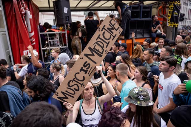 People dancing to a DJ playing on a mobile soundsystem in Piccadilly Circus during a #FreedomToDance protest on June 27, 2021 in London, England. (Photo by Rob Pinney/Getty Images)