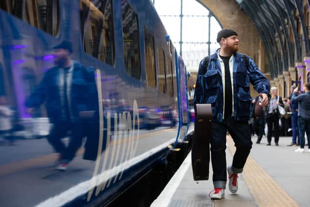 Singer songwriter, Tom Walker at Kings Cross, London ahead of the inaugural journey of the new Lumo train service. Credit: David Parry/PA Wire