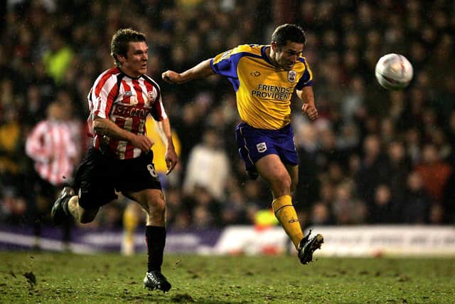 Paul Telfer of Southampton holds off Jay Tabb of Brentford during The FA Cup fifth Round 