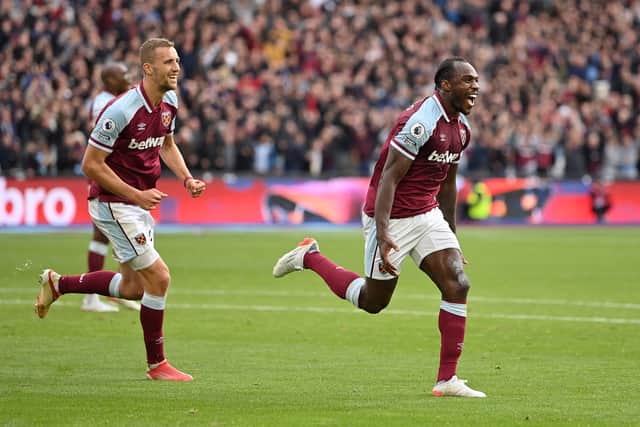 Michail Antonio of West Ham United celebrates after scoring their side’s first goal during the Premier League (Photo by Justin Setterfield/Getty Images)