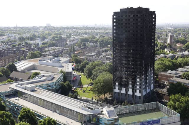 Grenfell Tower shortly after the fire had gutted it. Credit: TOLGA AKMEN/AFP via Getty Images