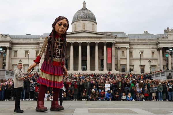 Little Amal arrives in Trafalgar Square. Photo by Hollie Adams/Getty Images