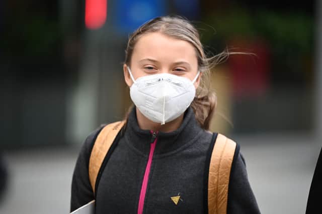 Climate activist Greta Thunberg joins a protest outside the headquarters of Standard Chartered. (Photo by Leon Neal/Getty Images)