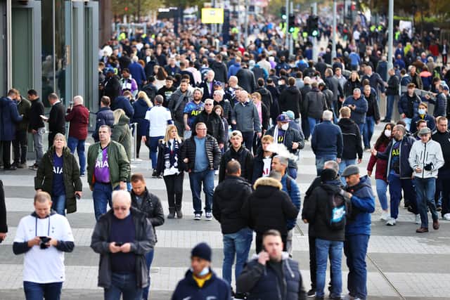 Tottenham Hotspur fans arrive at the stadium prior to the Premier League match (Photo by Catherine Ivill/Getty Images)