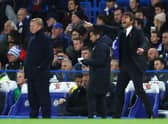 Antonio Conte, right, alongside former Everton boss Ronald Koeman. Picture: Clive Rose/Getty Images