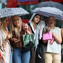 Londoners battle the wet weather 