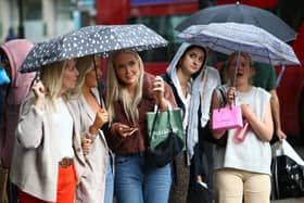 Londoners battle the wet weather 