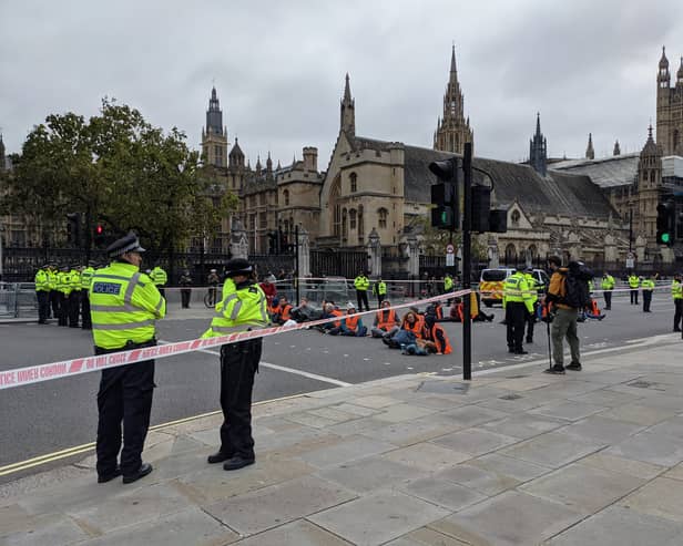 Insulate Britain protesters block Westminster Bridge. Credit: Harriet Clugston