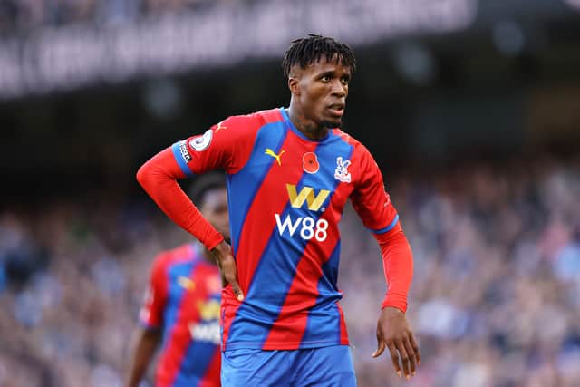 Wilfried Zaha of Crystal Palace looks on during the Premier League match (Photo by Naomi Baker/Getty Images)