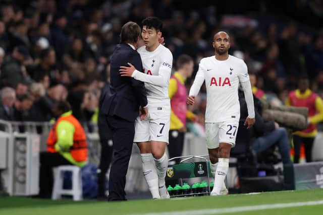 Heung-Min Son of Tottenham Hotspur embraces Antonio Conte  (Photo by Julian Finney/Getty Images)