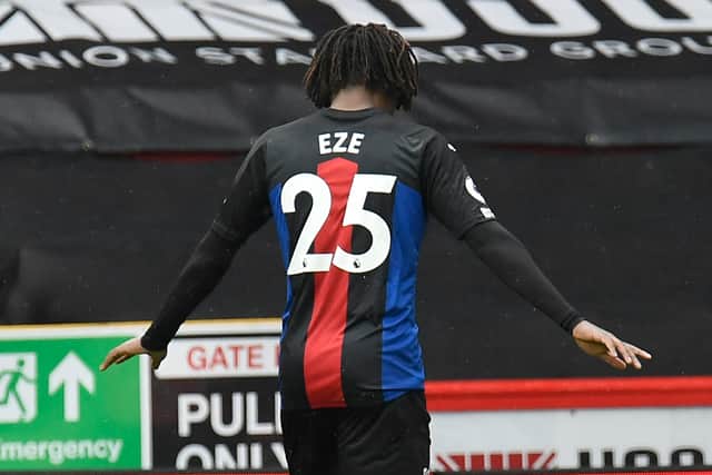 Crystal Palace’s English midfielder Eberechi Eze celebrates after he scores his team’s second goal  (Photo by PETER POWELL/POOL/AFP via Getty Images)