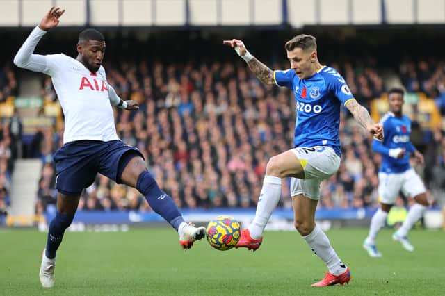 Emerson Royal of Tottenham battles for possession with Lucas Digne of Everton. Photo: Clive Brunskill/Getty Images