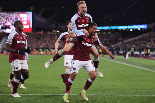 Pablo Fornals of West Ham United celebrates with Jarrod Bowen  (Photo by Alex Pantling/Getty Images)