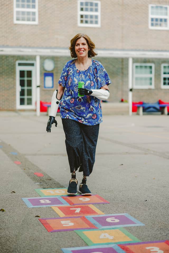 Teacher Kath Tregenna from London who is back in the classroom following a quadruple amputation - thanks to some clever bionic limbs. Credit: Paul Underhill / Open Bionics SW