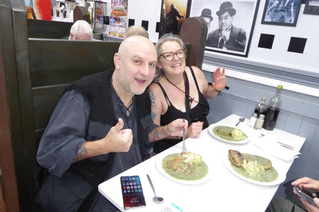 Eating a hot plate of pie, mash and liquor. Photographs courtesy of Mike Goldwater and Graham Hilling