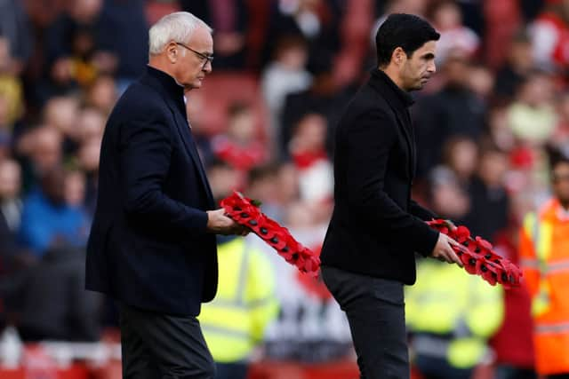 Watford’s Italian head coach Claudio Ranieri (L) and Arsenal’s Spanish manager Mikel Arteta (R) lay poppy wreaths ahead of kick off for Remembrance Sunday. Credit: TOLGA AKMEN/AFP via Getty Images