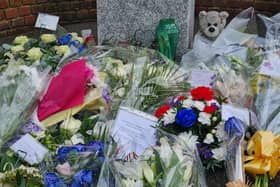 Flowers at the Croydon tram crash memorial. Photo: LondonWorld