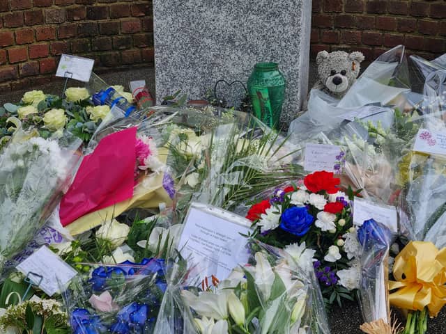 Flowers at the Croydon tram crash memorial. Photo: LondonWorld