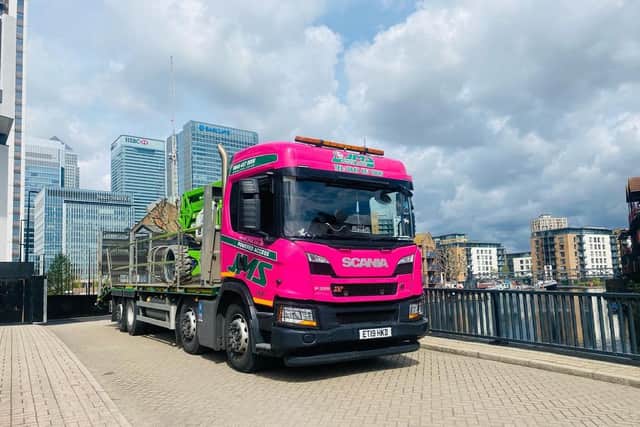 Jodi’s bright pink truck in Canary Wharf. Credit: Instagram/PinkTrucker90