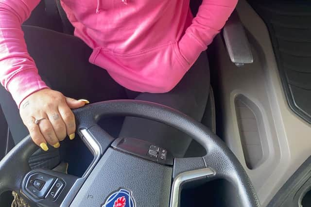 Jodi driving her truck. Credit: Instagram/PinkTrucker90