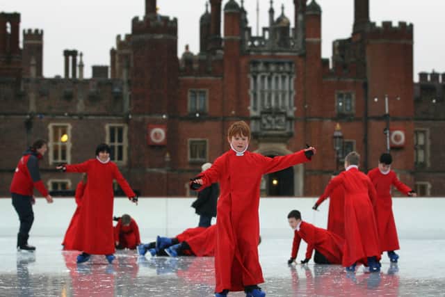 Members of Chapel Royal Choirboys choir attempt to skate at the Hampton Court Ice Rink. Credit: Dan Kitwood/Getty Images
