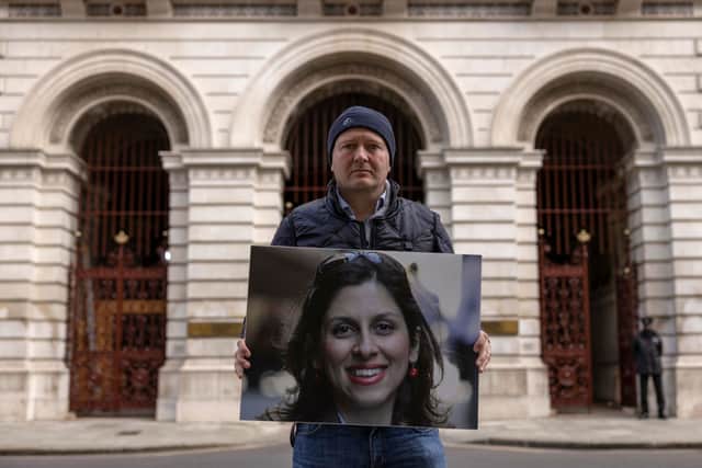 Richard Ratcliffe on day two of his hunger strike holding a photo of his wife Nazanin Zaghari-Ratcliffe, a British-Iranian national who is being held in Iran. Credit: Dan Kitwood/Getty Images