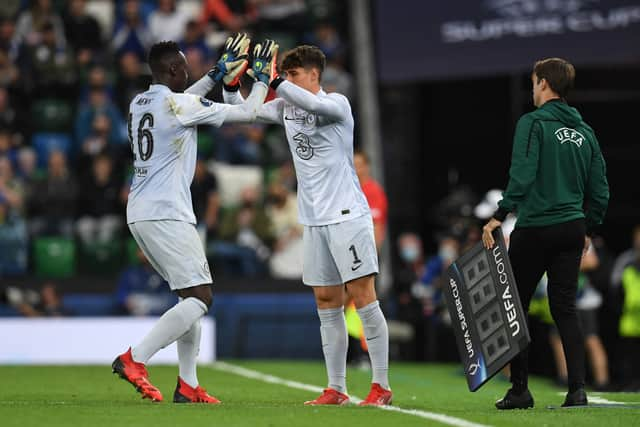 Chelsea's Spanish goalkeeper Kepa Arrizabalaga (R) replaces Chelsea's French-born Senegalese goalkeeper Edouard Mendy  (Photo by Paul ELLIS / AFP) (Photo by PAUL ELLIS/AFP via Getty Images)