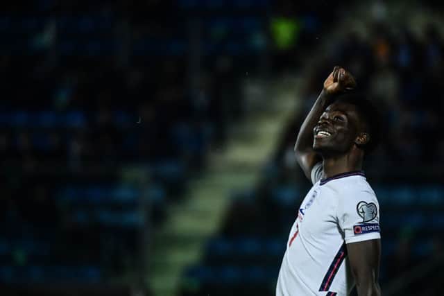 England’s midfielder Bukayo Saka celebrates after scoring his side’s 10th goal during the FIFA World Cup Qatar 2022 qualification Group I football match between San Marino and England. Credit: FILIPPO MONTEFORTE/AFP via Getty Images