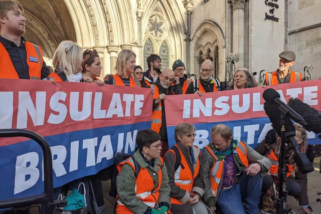 Insulate Britain protesters outside the High Court. Credit: Lynn Rusk