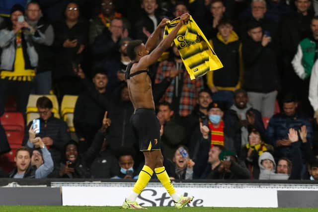 Watford's Nigerian striker Emmanuel Dennis celebrates scoring (Photo by IAN KINGTON/AFP via Getty Images)