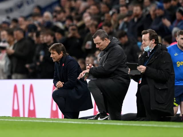 Antonio Conte, Manager of Tottenham Hotspur takes a knee in support of the Black Lives Matter (Photo by Shaun Botterill/Getty Images)