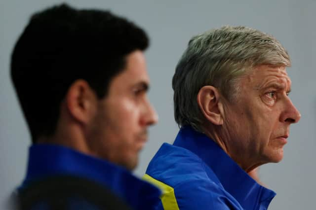 FC Arsenal's French head coach Arsene Wenger (R) and Arsenal's Spanish midfielder Mikel Arteta (L) attend a press conference (Photo credit should read PHILIPP GUELLAND/AFP via Getty Images)