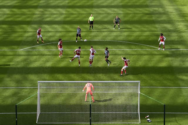 A general view of the action as the shadow lengthens across the pitch (Photo by Stu Forster/Getty Images)