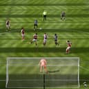 A general view of the action as the shadow lengthens across the pitch during the Premier League match (Photo by Stu Forster/Getty Images)