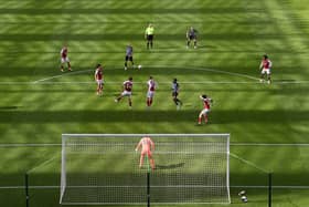 A general view of the action as the shadow lengthens across the pitch during the Premier League match (Photo by Stu Forster/Getty Images)