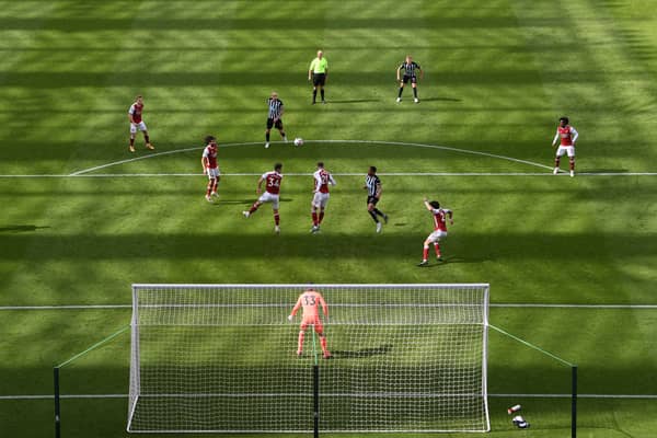 A general view of the action as the shadow lengthens across the pitch during the Premier League match (Photo by Stu Forster/Getty Images)